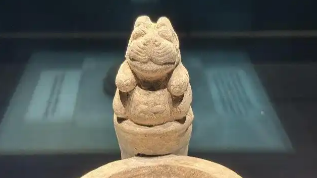 古人的熨斗上有个会打招呼的瑞兽