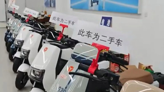 商家把库存电动车上好牌当二手车卖