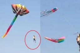 男子放巨型风筝反被带上天