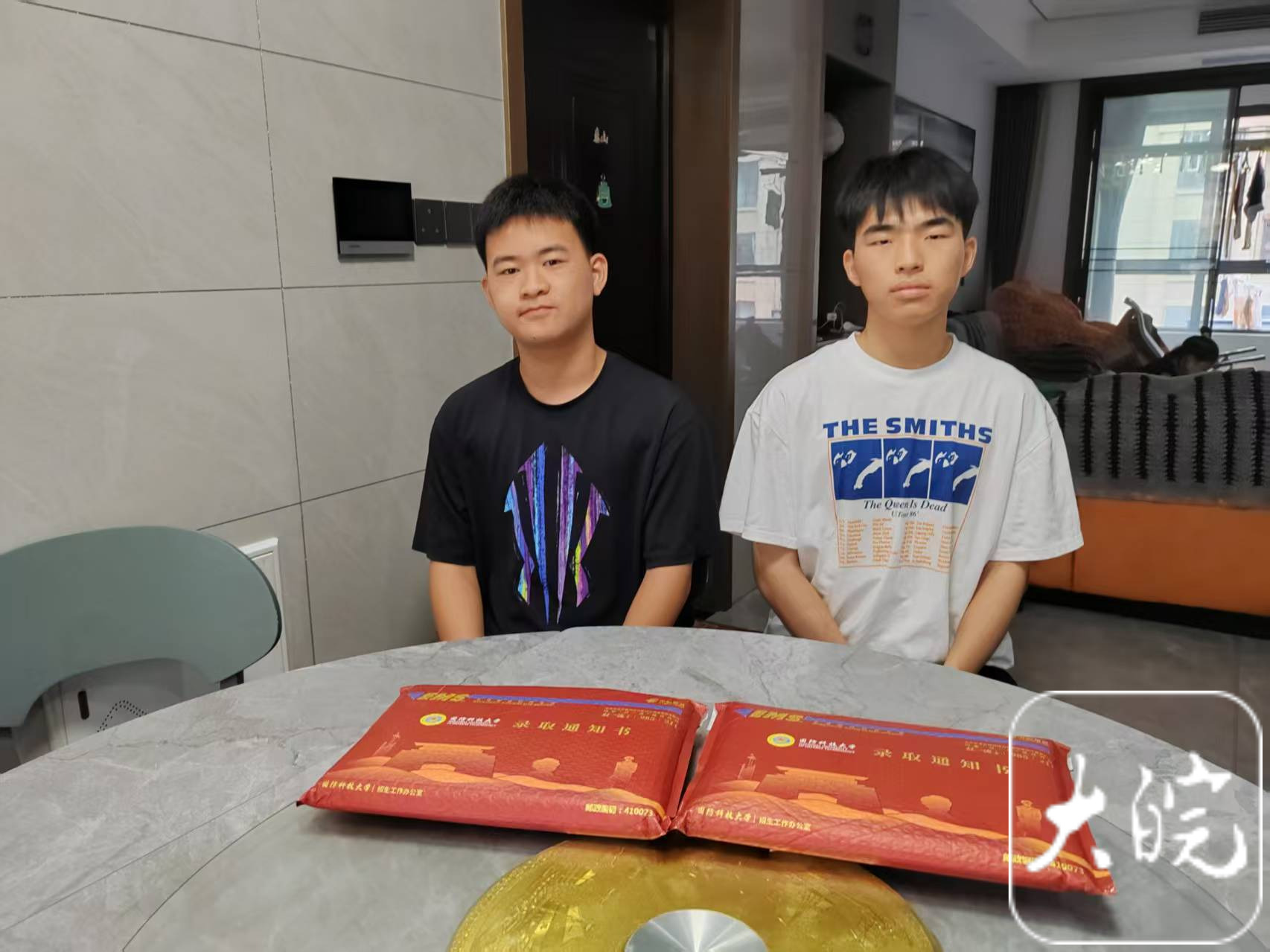  兄弟俩高考仅差2分双双考上国防科大