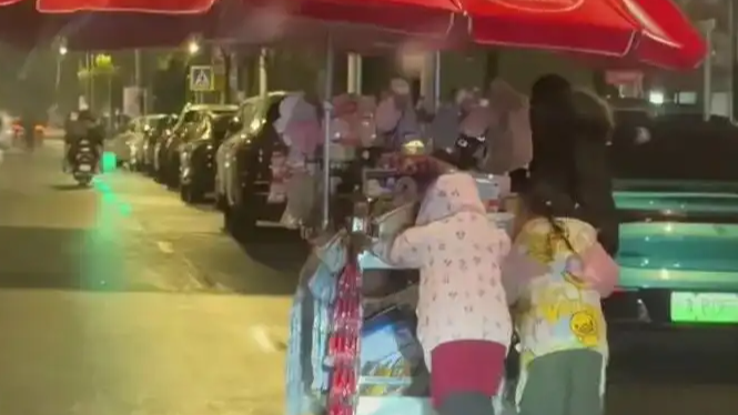 雨雪夜7岁女孩鞠躬被人民日报关注