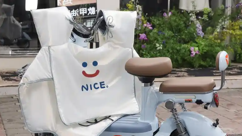 电动自行车“挡风被”到底该不该用