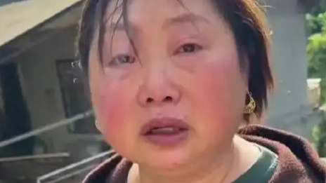  人民日报评“救灾女干部耳环事件”